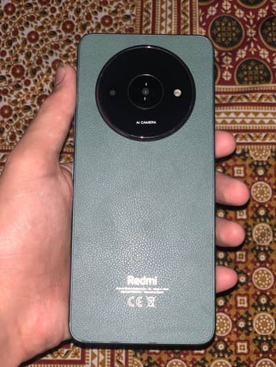 Redmi a3 4+4 128 with box and charger  local Wala hai original khrb hi