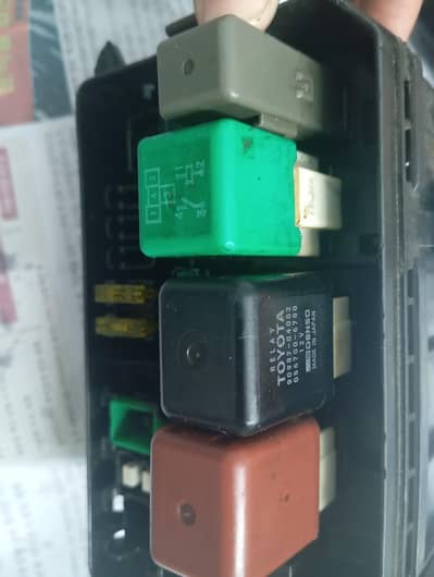 Indus corrolla fusebox and seat belt locks