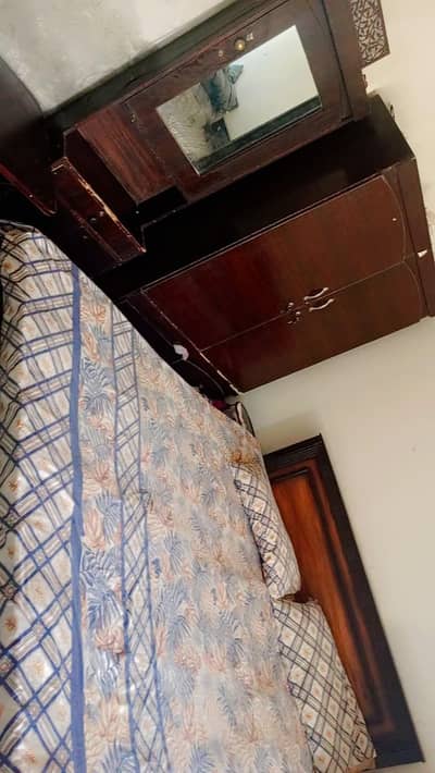 bed with mattress dressing table. and table