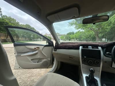 corolla 2012 XLI converted GLI