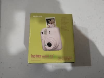 Fujifilm Instax Mini 12 Instant Camera – Like New Condition