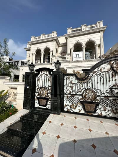 One Kanal Brand New Spanish Faisal Rasul Design Most Beautiful Bungalow 2 Servant Quarter In Basement For Sale At Prime Location Of DHA Lahore Near To Park Masjid &Amp;Amp; Commercial Market.