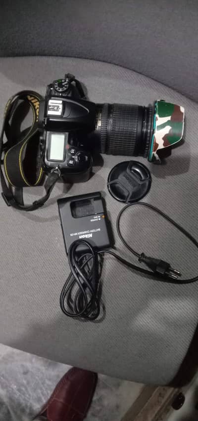 DSLR Nikon D7000 with 18/135mm Len's