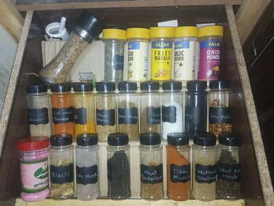 spice jars Mirch masaly Wali bottles.