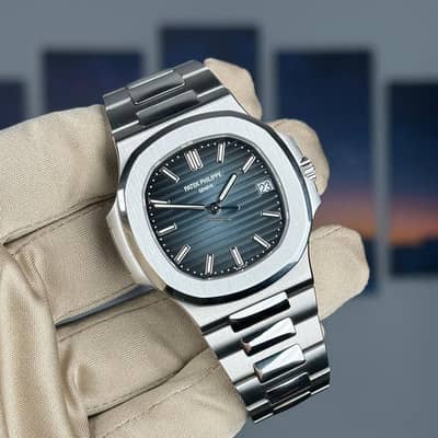 Luxury blue stripe dial Patek Philippe Nautilus for sale