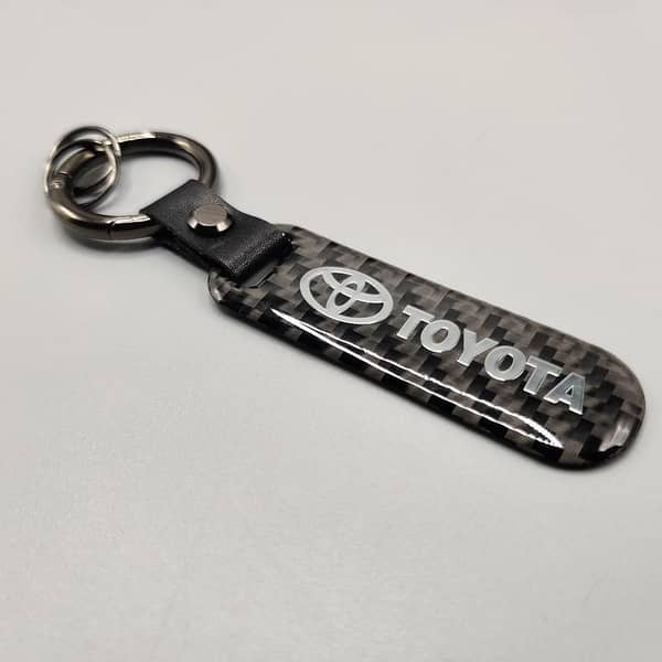 Toyota Carbon Fiber Keychain with Metal Ring – Premium Aluminum Alloy Key Holder (1 Pc)