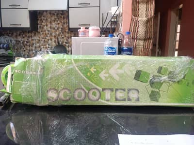 Kids Scooter – Adjustable Height – Green Color – Almost New