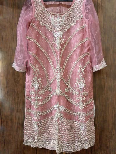 ladies stitched suit (used) with adda work .