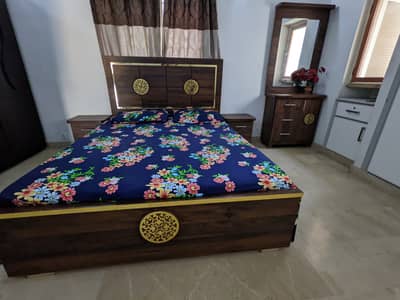 Bed , side table and dressing table