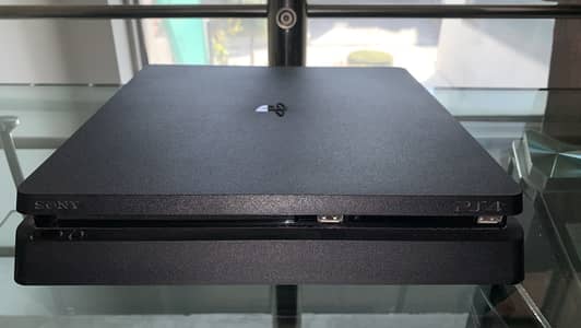 Ps4 slim 1TB with 2 controllers and 12 games
