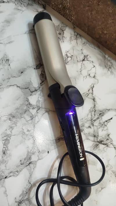 Remington hair styling curler, straightner and crimper