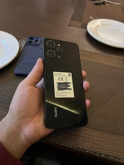 Redmi 12 with box 8/128gb 9/10 condition