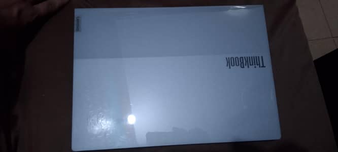 Think book with original charger and box in new condition