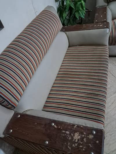Used 5 seater sofa set in good condition with heavy wooden structure