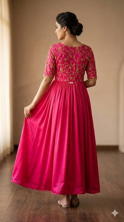 stunning hot pink anarkali/maxi dress with gold embroidery