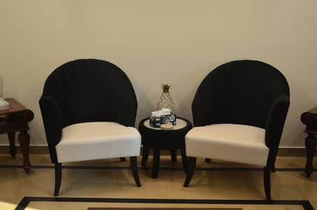 Two Single Seater Sofa With Table