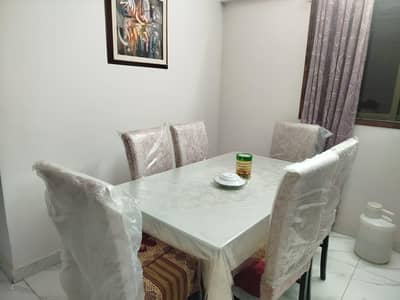 Glass and Wood Finished Dining Table with Six Chairs