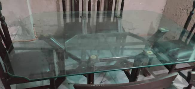 6 seater dinning table with glass top