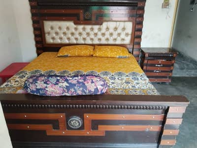 bed without matres and with  side table  dressing