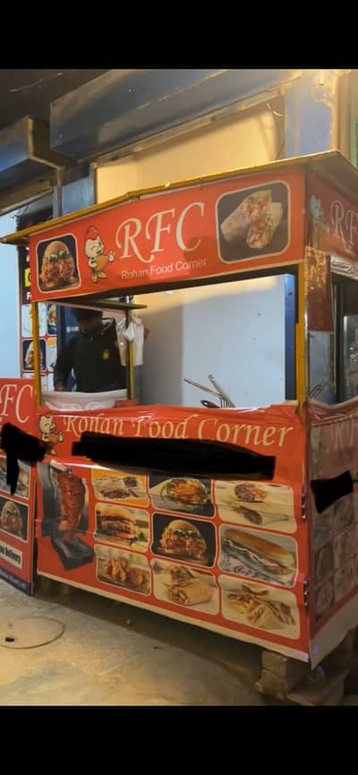 Burger making counter hot plate side with fry box