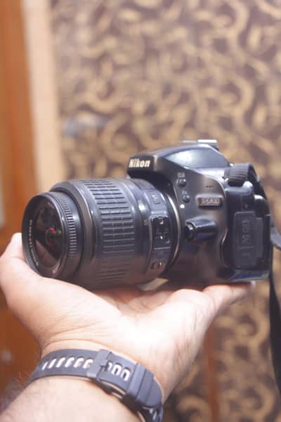 Nikon d5100 with 18 55mm lens Dx.