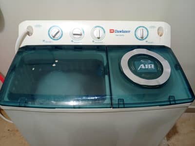 This is a Dawlance semi-automatic twin tub washing machine.