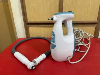 Black & Decker and Held Steam Cleaner