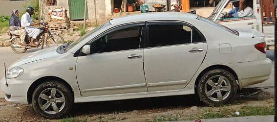 suprdari car Corolla 2005