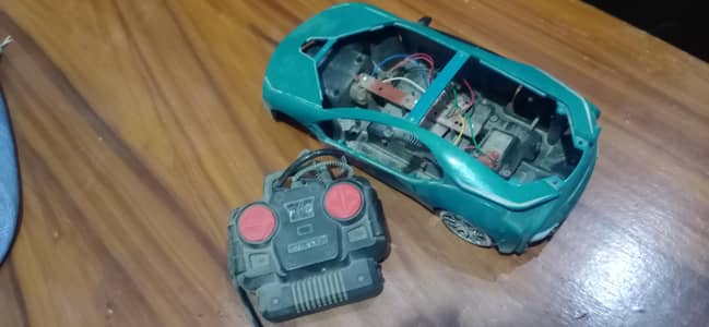 Broken toy car with remote