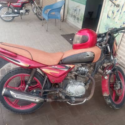 United 100 motorcycle in use.