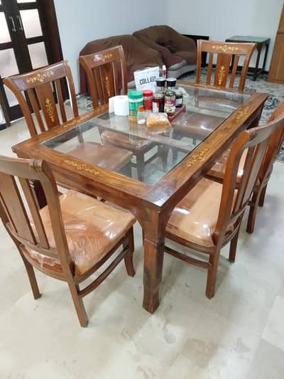 Six seater Dining Table good quality Wood.  and glass  table