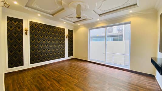 Experience Comfortable & Elegant Living in This Brand New 1-Kanal Elite Residence Featuring 5 Spacious Bedrooms, Basement & Dual Kitchens DHA Phase 6 Block N