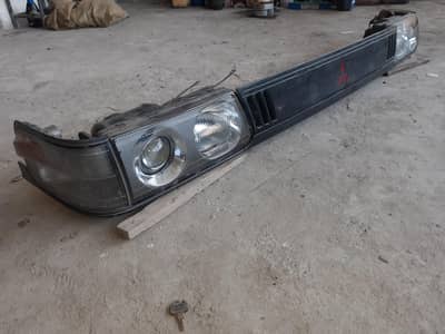 12 model Mitsubishi van headlights with jali