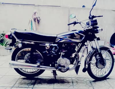 Honda 125 in good condition double accessories for sale