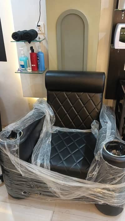 Black salon pedicure chair