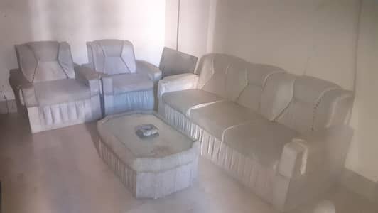 5 seater sofa with centre table for sale
