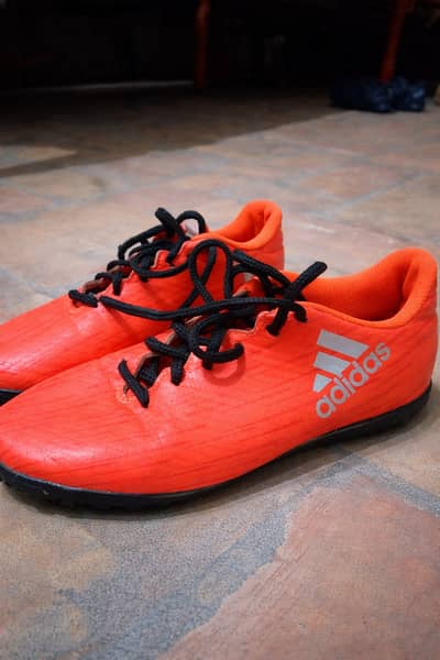 Bright orange adidas shoes condition ok .