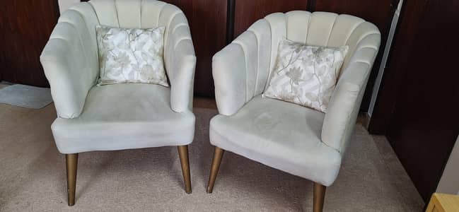 Two single seater bedroom sofas