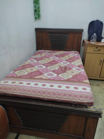 wooden single bed