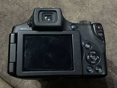 Canon SX60 HS Bridge Camera - DSLR Style with Ultra Zoom Lens