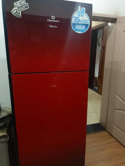 Dawalnce Full size Fridge 3 to 4 season used 10 by 10 condition