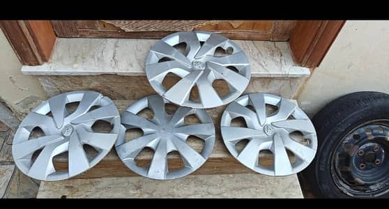 14 inch size stepney and tyre 21 date  complete with wheel cap