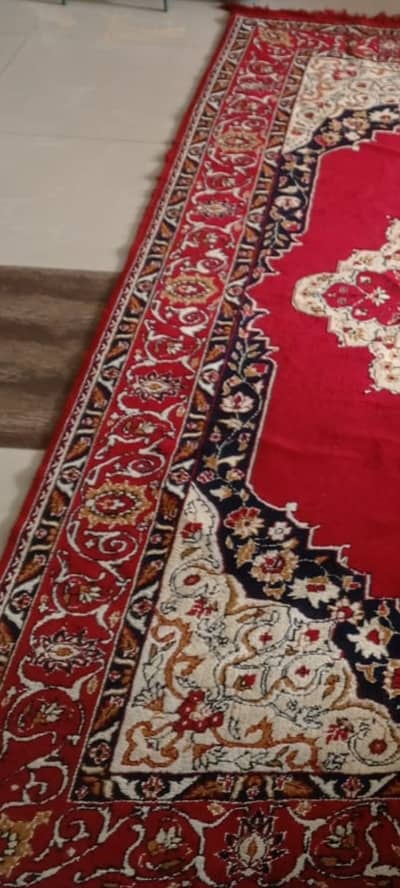 Woolen carpet. Luxurious colours