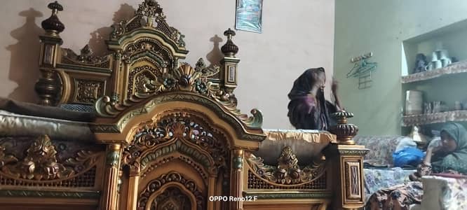 totally wooden like a new  badsha bed chiniuty set