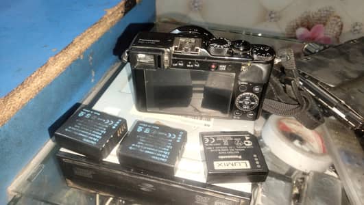 lx 100 with 3battery and led with 2battery chrger and bag