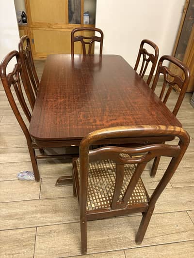 6 seater wooden dining table and chairs