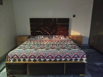 King size bed with side tables and dressing table