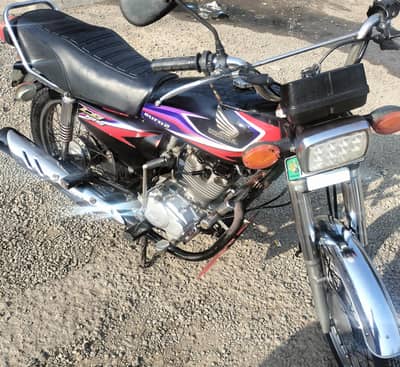 Honda 125 in neat and clean condition