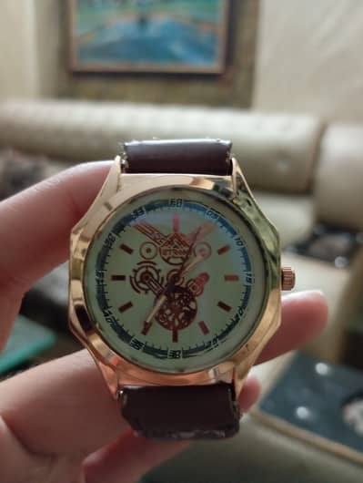 Spacial watch, Brown strap, Golden dile, Diamond cutting glass.