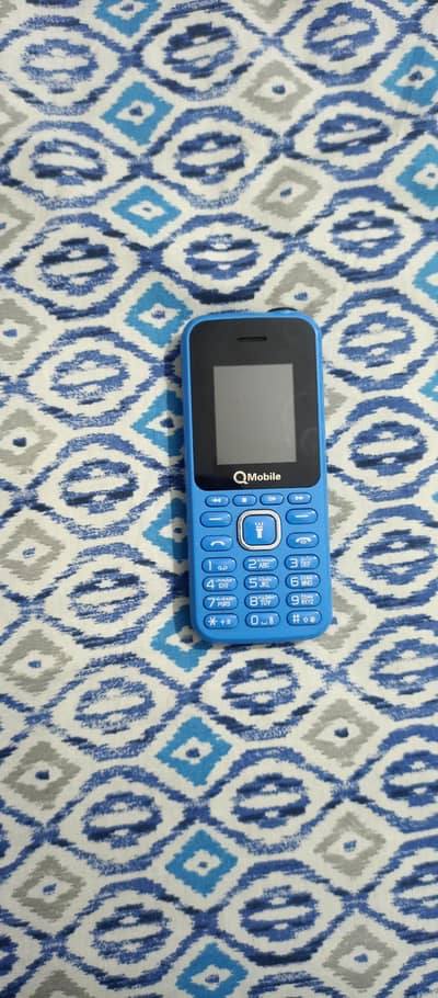 QMobile with torch and big speaker